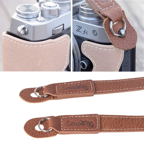 Leather camera strap with metal rings and stitched leather pad