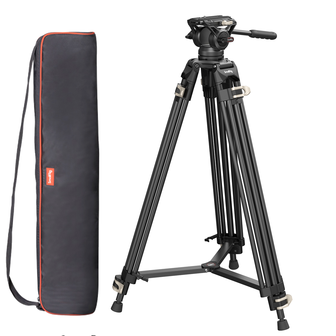 Black video tripod with fluid head and carrying case, orange trim