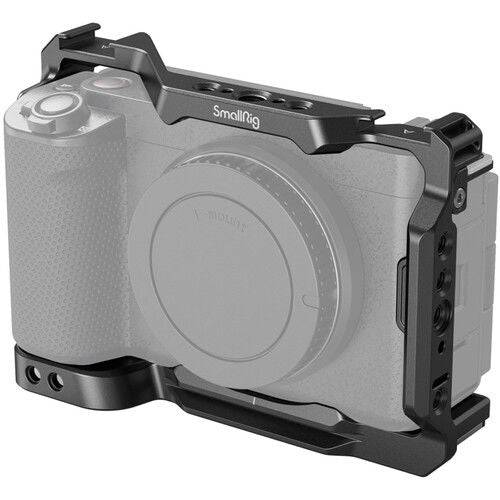 Camera cage for Sony ZV-E1 with top handle, side port access, and bottom mounting plate