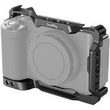 Camera cage for Sony ZV-E1 with top handle, side port access, and bottom mounting plate