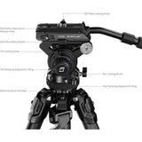 Hydraulic tripod head close-up with pan and tilt locking knobs