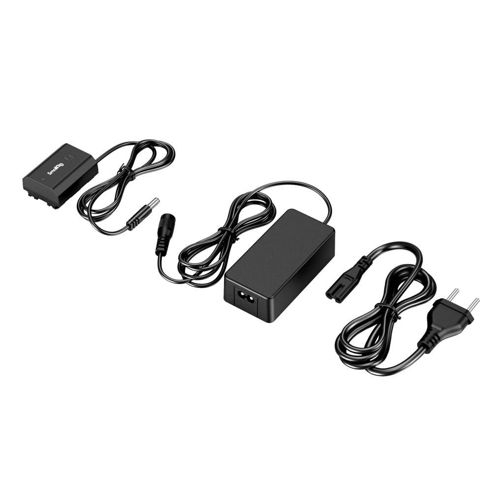 Dummy battery module, AC power adapter, and connecting cables laid out
