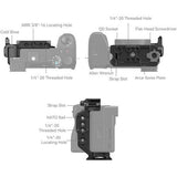 Half cage layout with 1/4-20 threads, ARRI 3/8-16 locating holes, and QD socket