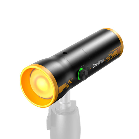 Front view of black focusable LED video light with yellow reflector ring and mounting base