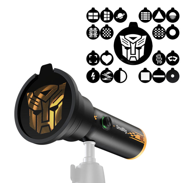 Black portable focusable LED video light with yellow rim; front lens and control area
