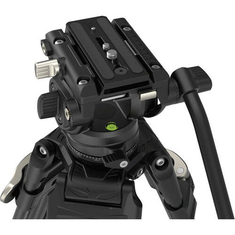 Close-up of black fluid tripod head with adjustment controls