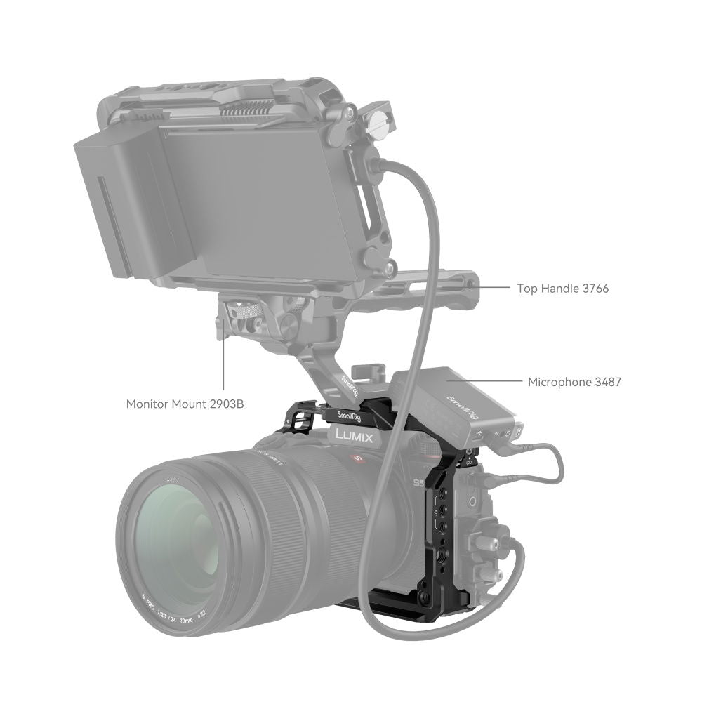 Camera cage with monitor mount and microphone mount, connected to top handle and cables