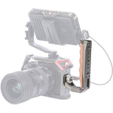 Wood-grip gray locating handle mounted on camera top rail