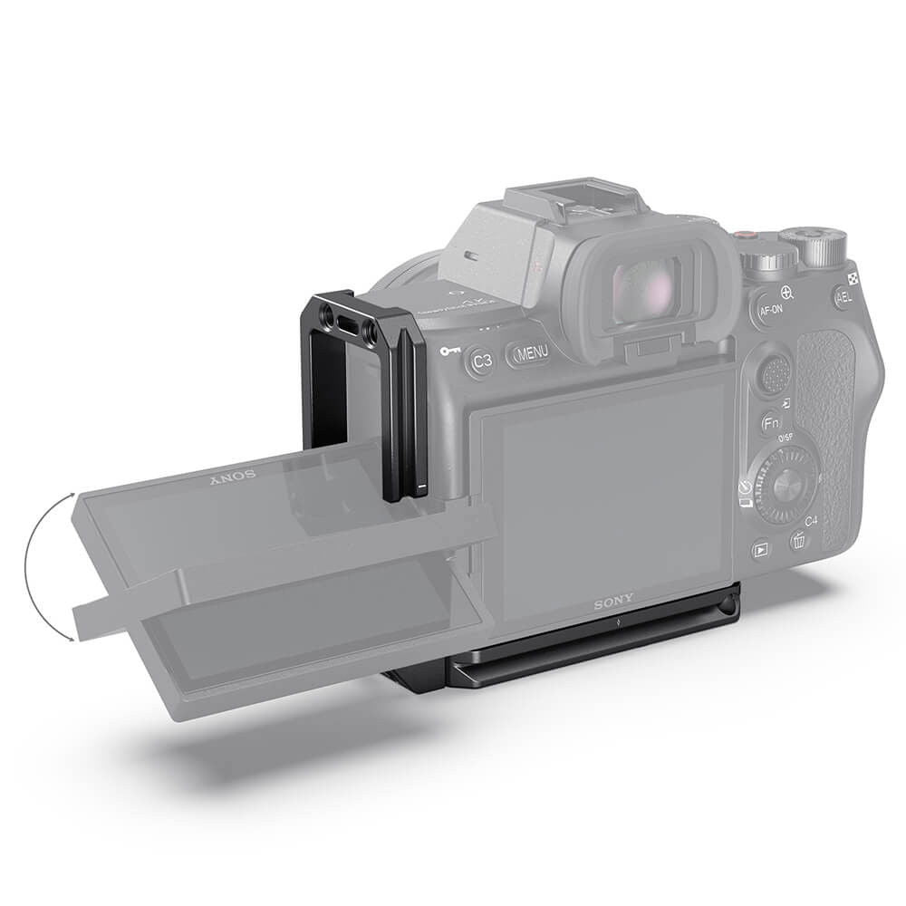 L-bracket mounted on camera screen side, black metal rails and top connector