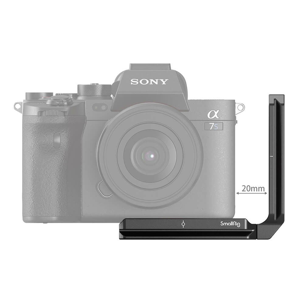 L-bracket mounted on camera front side, slim vertical arm with 20mm reference