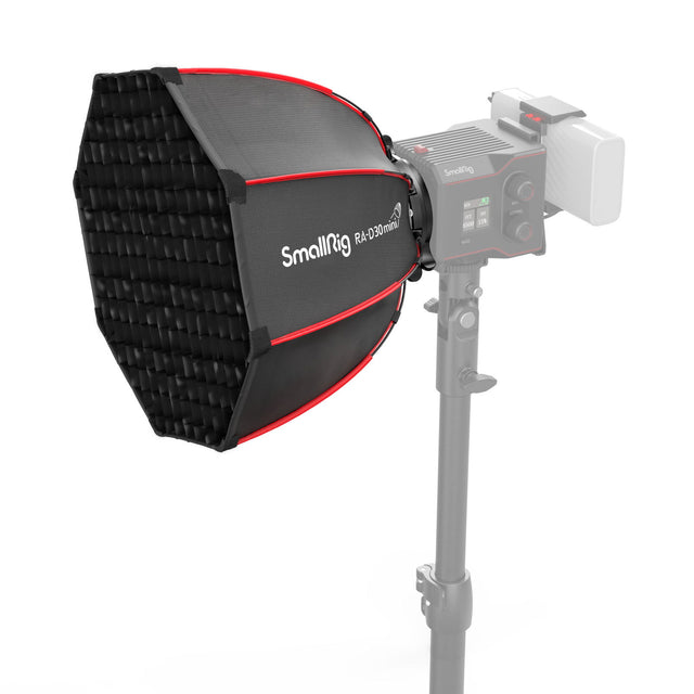 RA-D30 mini parabolic softbox, black with red trim, on LED video light mount