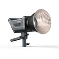 RC220D LED video light with round reflector and side handle, on a mounting stand