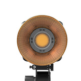 Bicolor COB video LED light, circular reflector and glowing central emitter