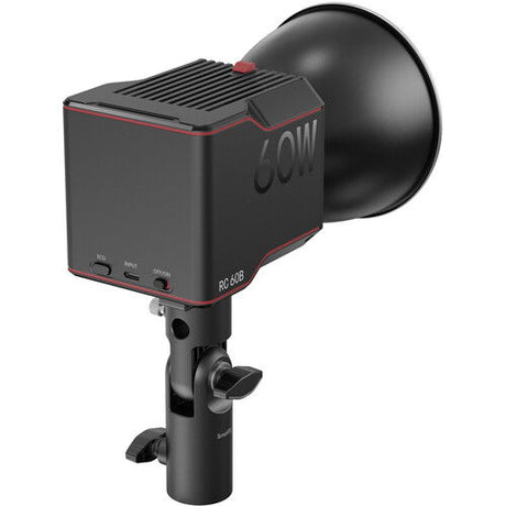 Bi-color LED video light with side ports and compact body, mounted on a handheld stand