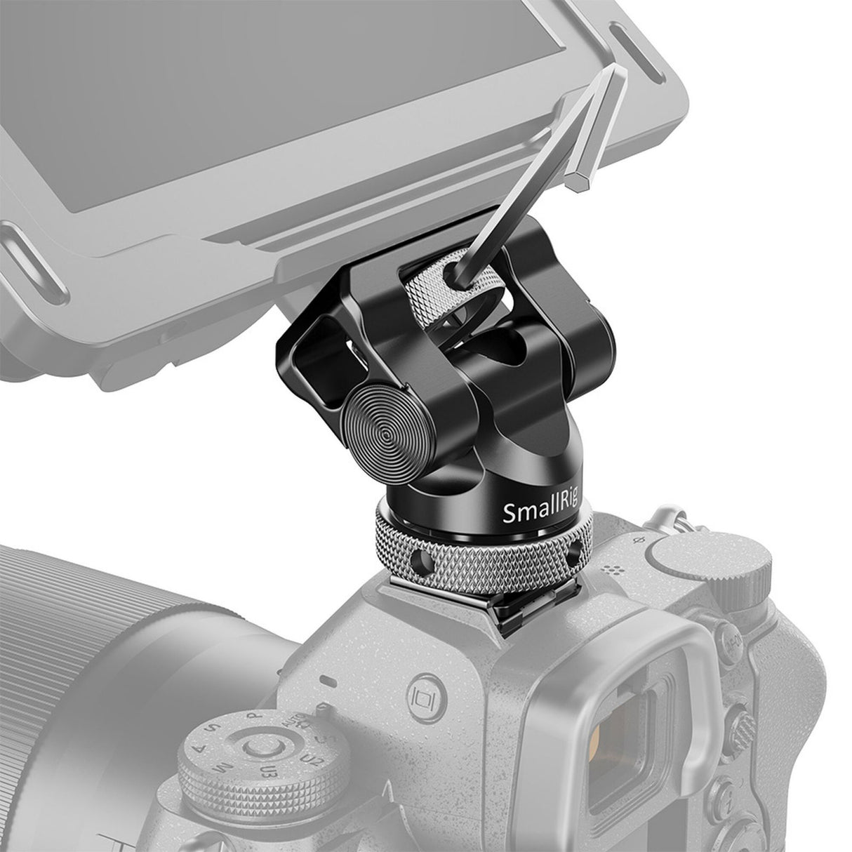 Cold shoe on a black monitor bracket mounted to camera top rail, textured wheel