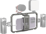Universal phone cage mounted with smartphone, cold-shoe mount and side ports