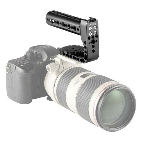 Matte black top handle with mounting plate and rosette for camera lens setup, side view.