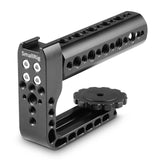 Matte black long lens handle with circular rosette and accessory rails on both sides.