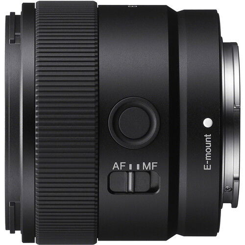 Sony 11mm f/1.8 E-mount lens side view, AF/MF switch, E-mount contacts, black