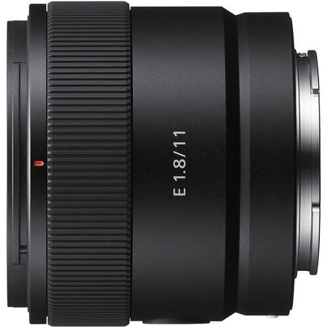 Sony 11mm f/1.8 E-mount lens side, ribbed focus ring and E 1.8/11 text, black