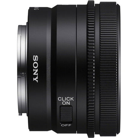 Side view of black lens barrel with ribbed focus ring and Click-ON switch