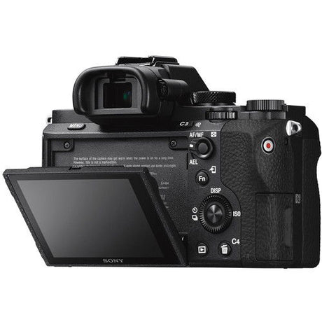Mirrorless camera angled view with rear LCD open and top dials