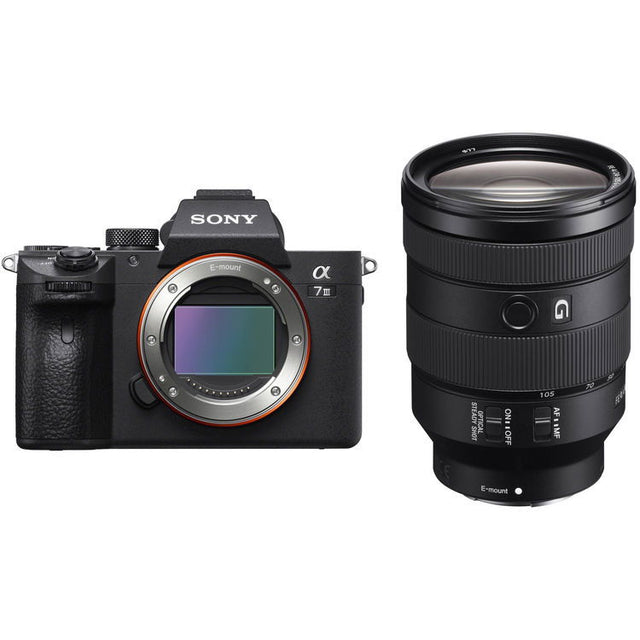 Black mirrorless camera body with attached lens, front view