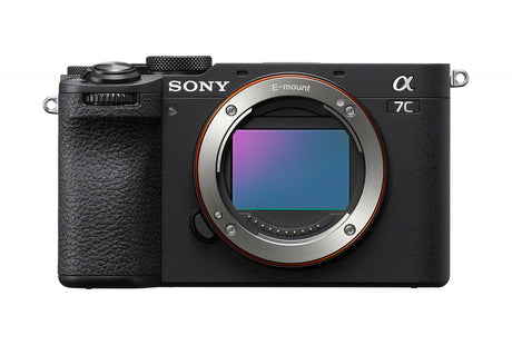 Mirrorless camera body, top front with E-mount ring and lens opening