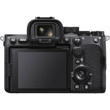 Black mirrorless camera rear view with LCD screen and control buttons