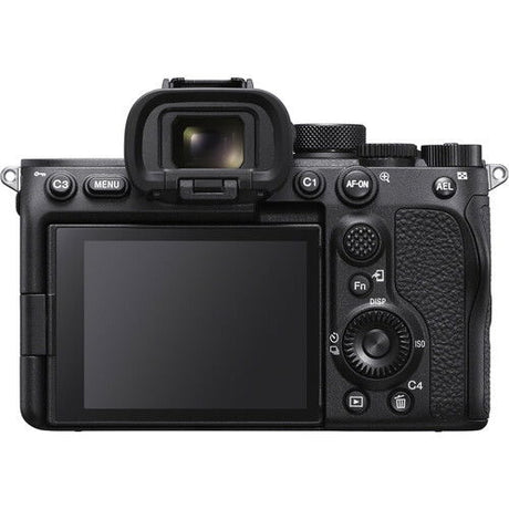 Black mirrorless camera rear view with LCD screen and control buttons