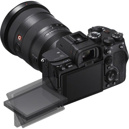 Black mirrorless camera angled with lens and tilting LCD screen