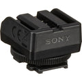 Black camera accessory adaptor with multi-pin contact opening