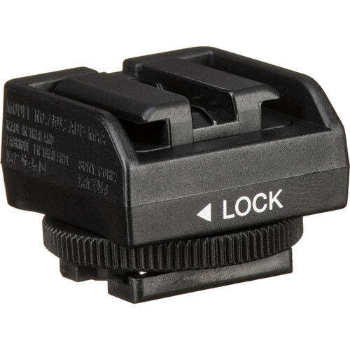 Black adaptor head with LOCK label and side latch details