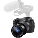 RX10 IV camera with mounted microphone on top and zoom lens front