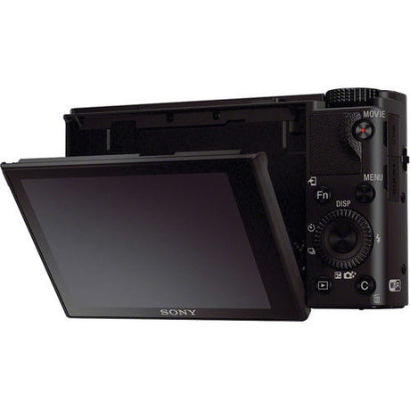 Compact camera back view with articulating LCD and visible control buttons.
