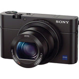 Black compact digital camera front view with lens and SONY logo on top.
