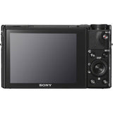 Rear view of black compact camera with LCD screen and control buttons