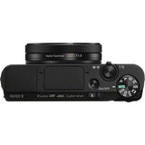 Side view of black compact camera showing zoom lever and mode buttons