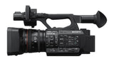 Black 4K professional video camera side profile with lens and top handle