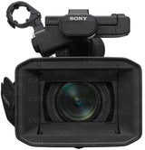 Black 4K video camera front view with mic grille and open LCD screen