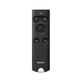 Black Sony wireless remote with circular D-pad and plus/minus buttons