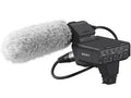 Sony XLR adapter with gray foam windscreen and camera hot-shoe mount