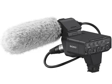 Sony XLR adapter with gray foam windscreen and camera hot-shoe mount