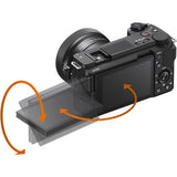 Black camera body with tilting LCD screen and control buttons