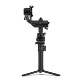 3-axis gimbal stabilizer side view, black handle grip and three-legged base
