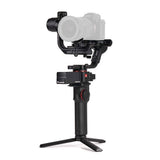 3-axis gimbal stabilizer with camera mounted, black body and three-leg base
