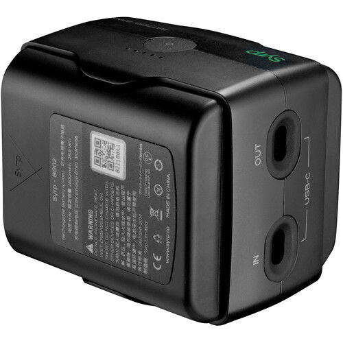 Black 5600mAh battery bank with label and output ports, close-up view