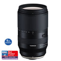 Black 18-300mm zoom lens with zoom scale and lock switch on barrel