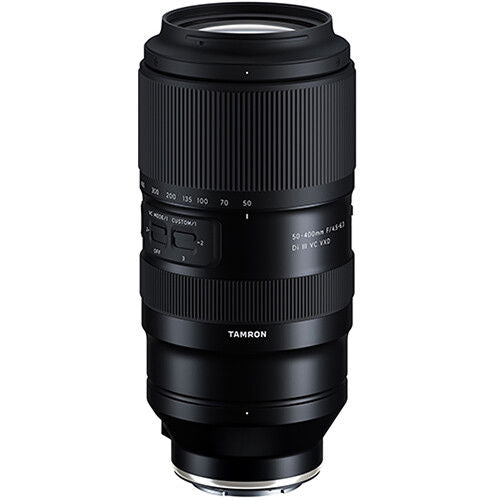 Black Tamron telephoto zoom lens with ribbed grip and zoom/focus controls