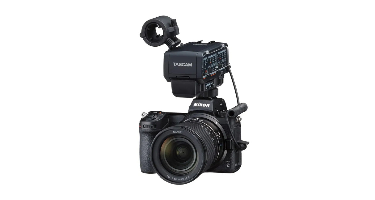 Camera-mounted XLR audio adapter unit with mounting bracket and cable connector, black